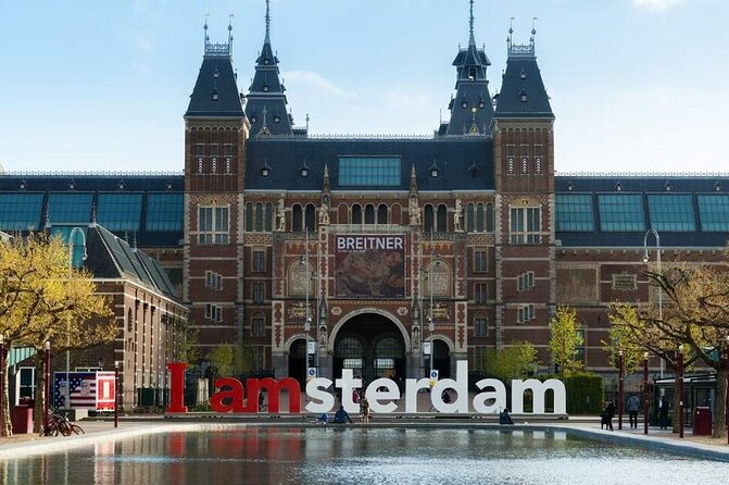 1 Hour Private Amsterdam Rickshaw Tour - Dam Square, from medieval dam to modern street theater
