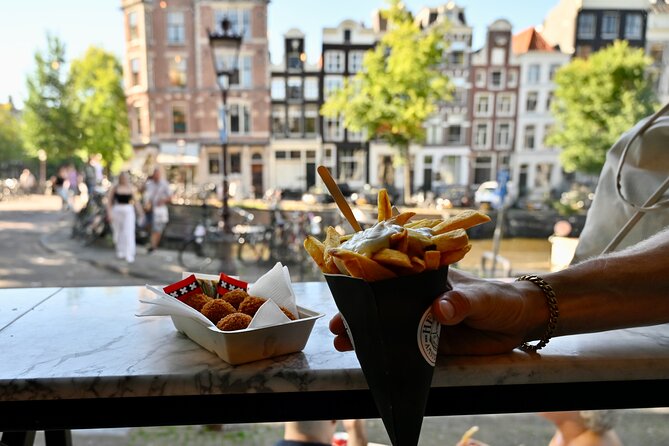 10 Tastes of Amsterdam: Food Tour by UNESCO Canals and Jordaan - The 400-year-old university stop, Dutch spirits and bitterballen energy