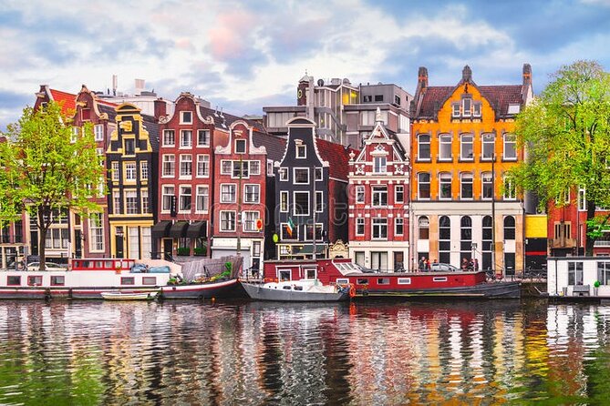 5 hrs Golden Age Amsterdam Private Walking Tour With Local Guide - Meet at Amsterdam Centraal, then walk the city’s building logic