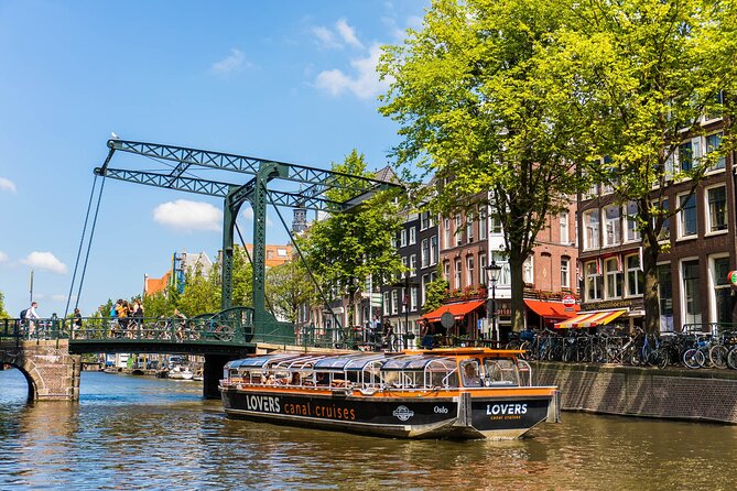 Amsterdam 1h Canal Cruise by Semi-Open Boat with Audio Guide - A solar-powered, semi-open boat makes the canal belt feel close