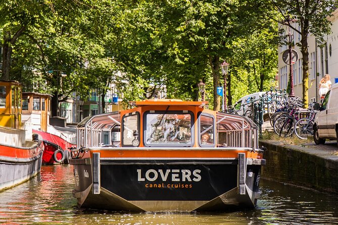 Amsterdam 1h Canal Cruise by Semi-Open Boat with Audio Guide - Who this 1-hour canal cruise is best for