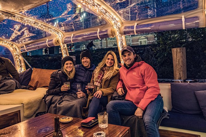 Amsterdam 2-Hour Evening Cruise With Live Guide and Bar - Nemo, Central Station by Pierre Cuypers, and the Sea Palace replica