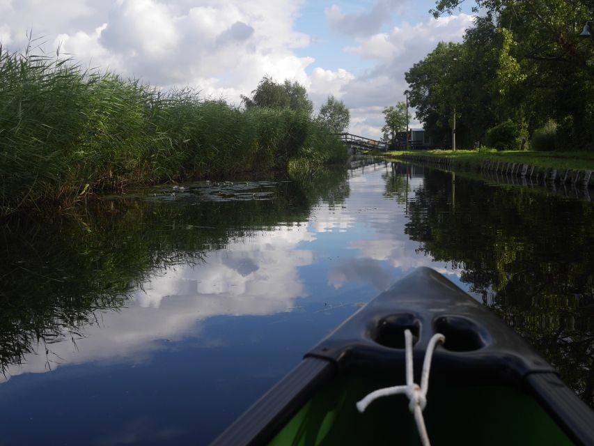 Amsterdam: 2-Hour Guided Canoe Trip - Why Watergang canals feel like a mini reset from Amsterdam