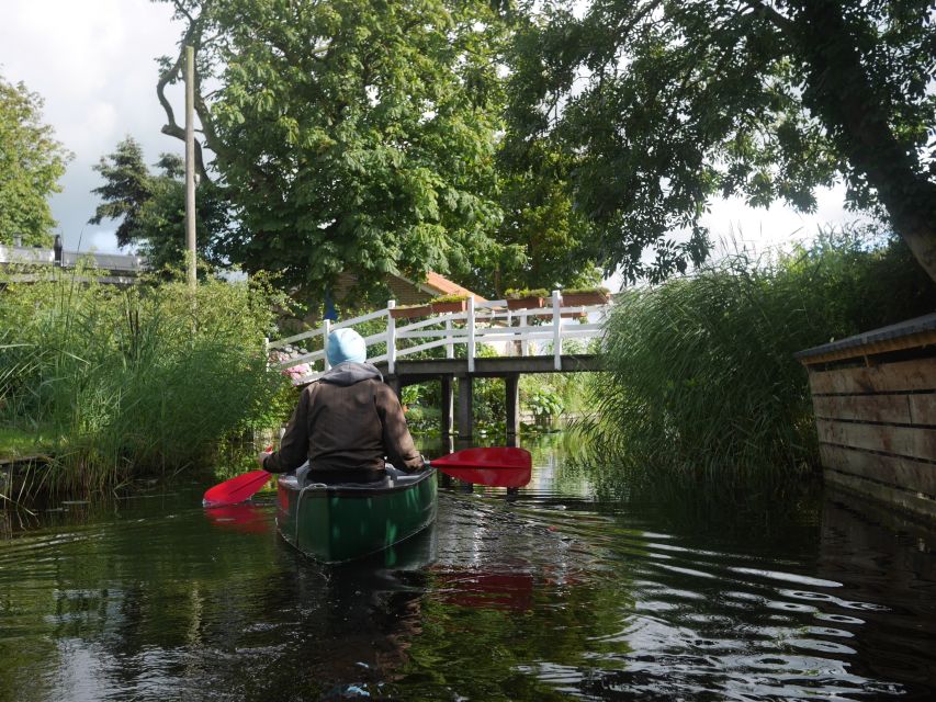 Amsterdam: 2-Hour Guided Canoe Trip - The blue house meeting point, safety check, and your canoe setup