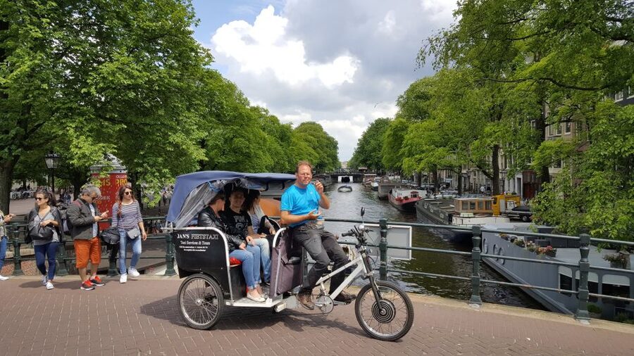 Amsterdam: 2-Hour Sightseeing Tour by Rickshaw - Guide style: how Jan, Han, and others shape the experience