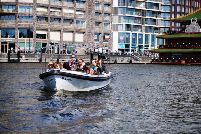 Amsterdam: 60-Minute Guided Private Canal Cruise with Drinks - Seven Bridges on Reguliersgracht: Postcard Views That Actually Make Sense