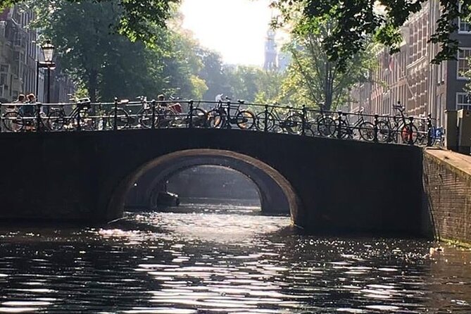 Amsterdam 90-min Private Canal Cruise with Live Guide and Drinks - Jordaan canals: the calm, art-world side of the city