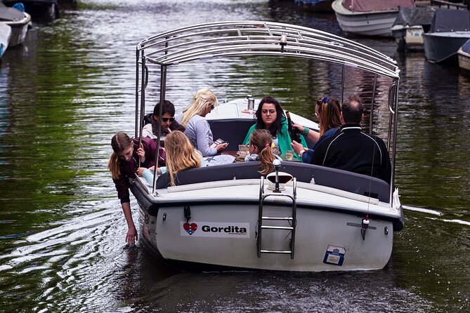 Amsterdam 90-min Private Canal Cruise with Live Guide and Drinks - The Amstel and the mix of old and new
