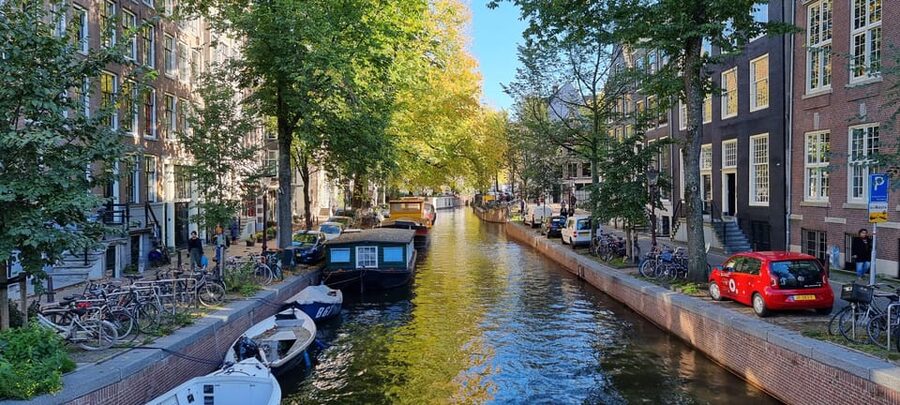 Amsterdam All In One Tour Walking Tour - Price and Value: A Short Walk With Tip-Based Guidance