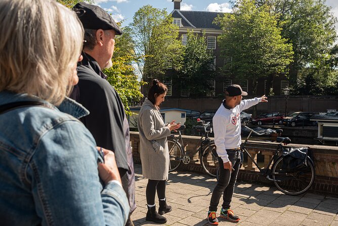 Amsterdam: Anne Frank and World War II Walking Tour (TOP RATED) - De Plantage and Spinoza Monument, remembering in everyday streets