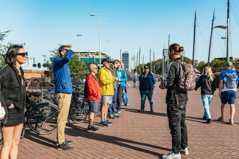 Amsterdam Bike Tour in Small Group + Optional Canal Cruise - Centraal Station, Artis Zoo, and De Gooyer windmill: learning the city’s landmarks in order