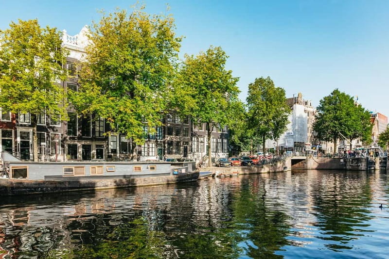 Amsterdam Bike Tour in Small Group + Optional Canal Cruise - Optional 1-hour canal cruise with drinks and cheese: worth it if you like slow time