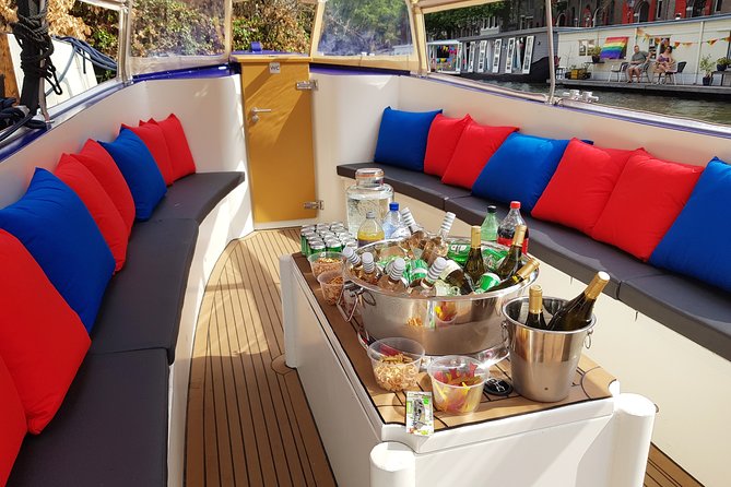 Amsterdam: Canal Booze Cruise with Unlimited Drinks Option - Amsterdam canal cruise, but with an open-bar rhythm