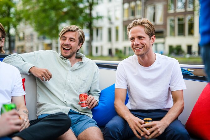 Amsterdam: Canal Booze Cruise with Unlimited Drinks Option - De Wallen and Dam Square options: see the Red Light District without hours of wandering