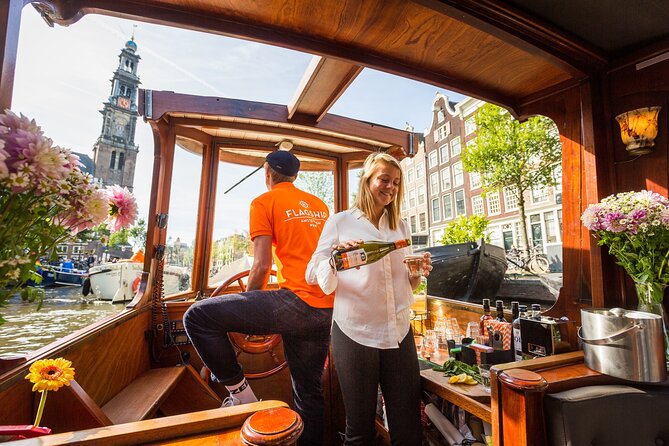 Amsterdam Canal Cruise in Classic Salon Boat With Drinks and Cheese - Finding your boat: orange guides and the Leliegracht 50 backup plan