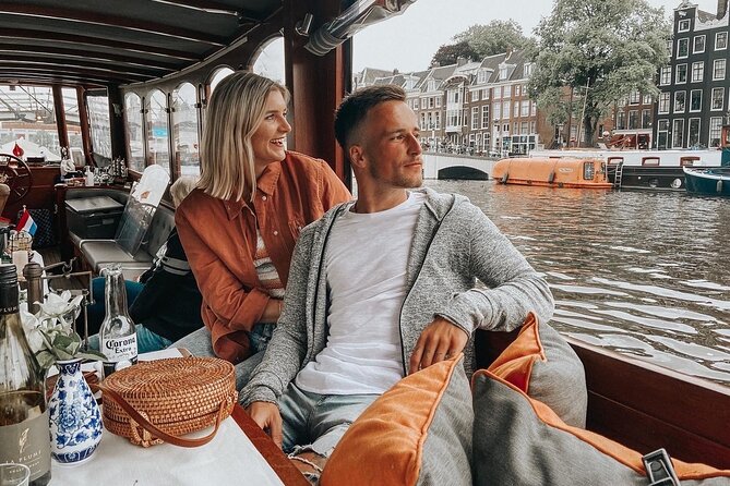Amsterdam Canal Cruise in Classic Salon Boat With Drinks and Cheese - Night cruising, special days, and why it often feels like a win