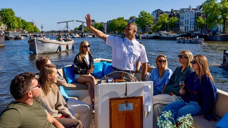 Amsterdam: Canal Cruise in Open Boat with Drink Option - Why a 1-hour electric canal cruise for $19 is smart value