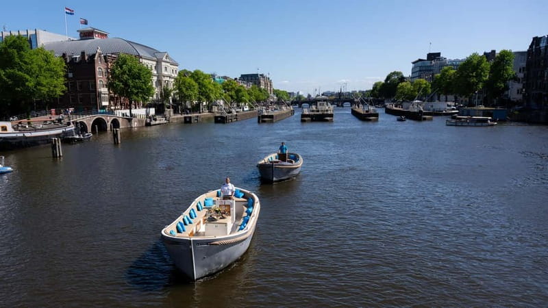Amsterdam: Canal Cruise in Open Boat with Drink Option - What the open-boat ride changes for your Amsterdam photos