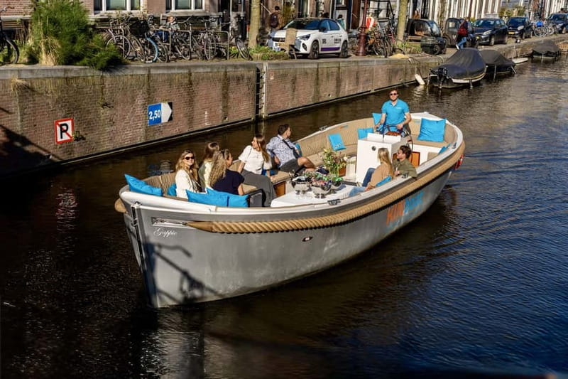 Amsterdam: Canal Cruise in Open Boat with Drink Option - Groenburgwal shopping, Dancing Houses, and the Herengracht line-up