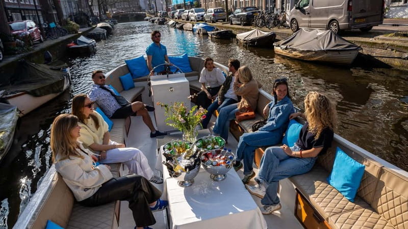 Amsterdam: Canal Cruise in Open Boat with Drink Option - Timing, drinks, and comfort tips for a better ride