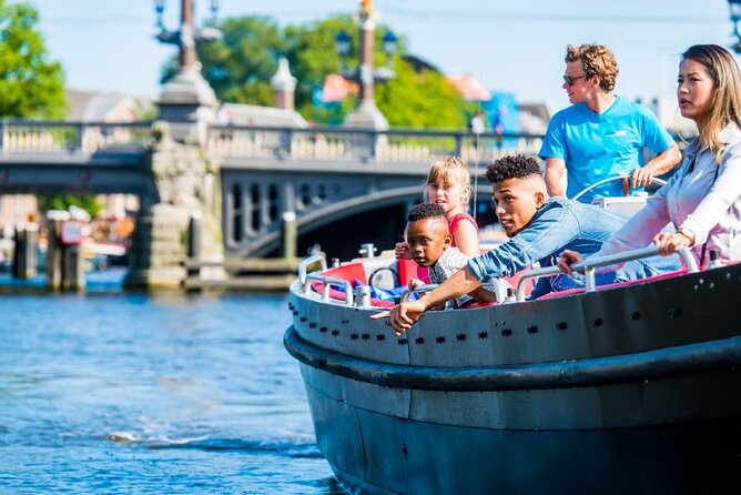 Amsterdam Canal Cruise in Open Boat with Unlimited Drinks Option - Cruising past the Hermitage Museum area without the museum crowds