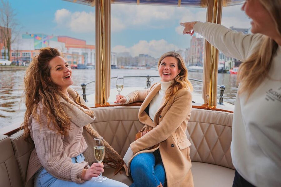 Amsterdam: Canal Cruise with Bubbles & Bites - The Anne Frank House area: how to handle a heavy moment on a boat