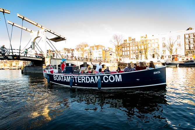 Amsterdam Canal Cruise With Live Guide and Unlimited Drinks - Landmark Highlights You Can Spot From the Water