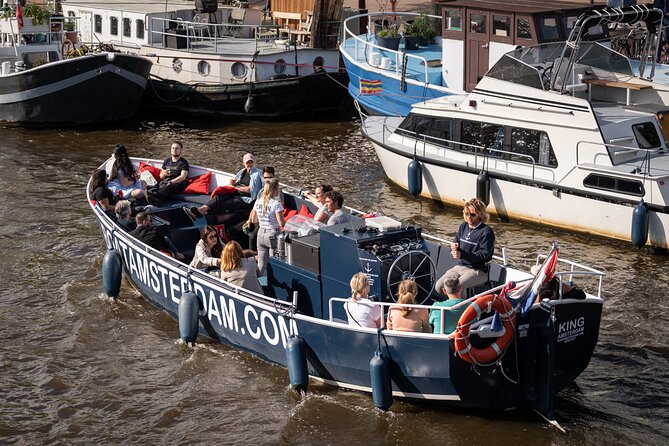 Amsterdam Canal Cruise with Live guide & Two drinks - Central St. - Key highlights worth your attention