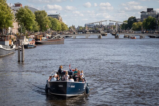 Amsterdam Canal Cruise with Live guide & Two drinks - Central St. - Red-light district, an old church, and how the guide keeps it family-friendly
