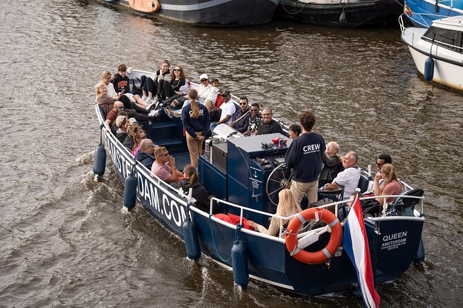 Amsterdam Canal Cruise with Live guide & Two drinks - Central St. - Central Station from the water: the landmark that anchors your sense of place