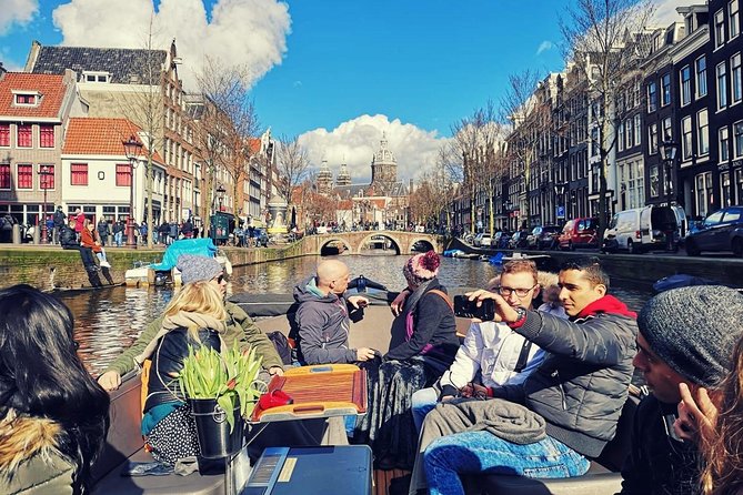 Amsterdam Canal Tour by Open Boat – 90 min Small Group Experience - Munt Tower Views and the Transition Into the Canal Maze