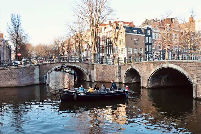 Amsterdam Canal Tour by Open Boat – 90 min Small Group Experience - Nieuwmarkt to the Eastern Canal Belt: De Waag and Boundary Canals