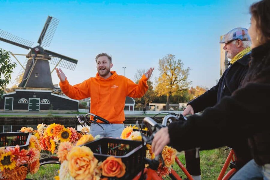 Amsterdam: Cheese Tasting, Windmill & Countryside Bike Tour - Canals, Het Scheepvaartmuseum, and the De Gooyer Windmill Stop