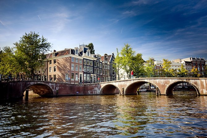 Amsterdam City Centre Cruise on heated boat with Audioguide - Stop by Stop: What Each Landmark Adds to Your Cruise