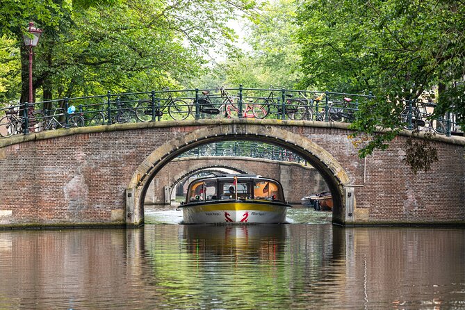 Amsterdam City Centre Cruise on heated boat with Audioguide - Small Extras: Wi-Fi and the Free Stroopwafel at Damrak Pier 5