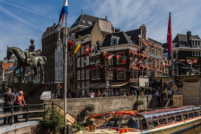 Amsterdam City Highlights and Hidden Gems - Private & Custom Tour - Central square and quiet passageways: bookstores, cafés, and side streets