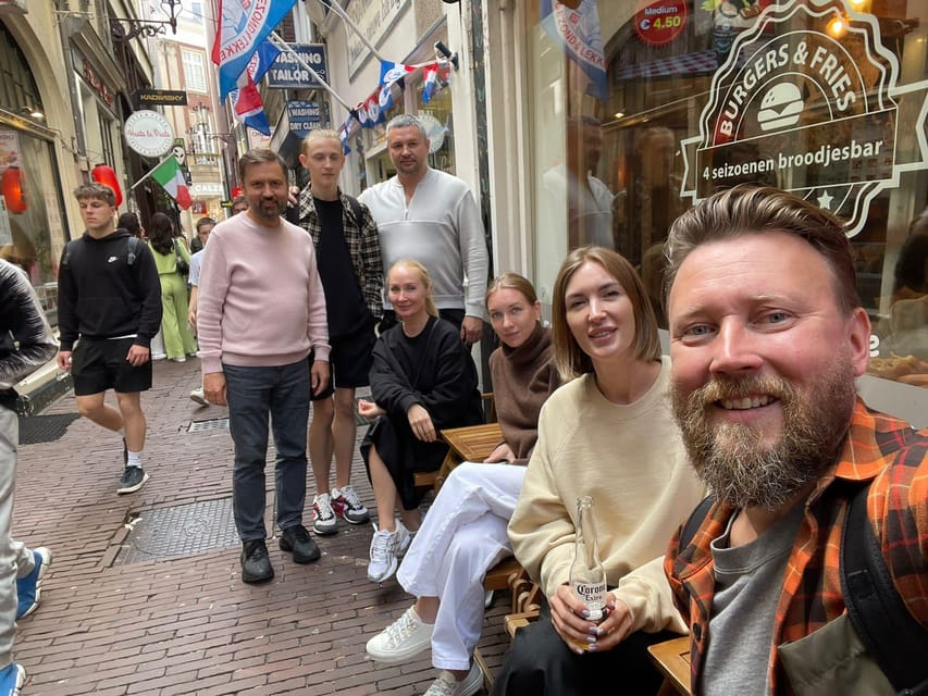 Amsterdam: City Highlights Walking Tour - Entering Amsterdam with a 2-hour plan that doesn’t waste your time