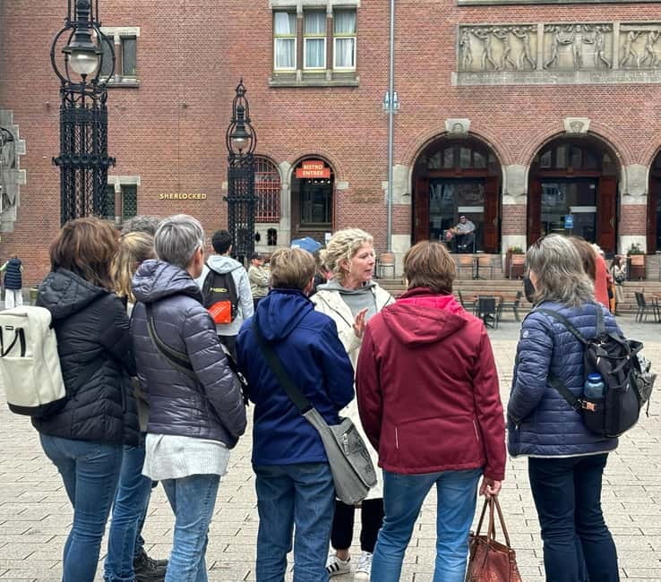 Amsterdam: City Tour in German - Religion, the colonial past, and the monarchy, explained simply