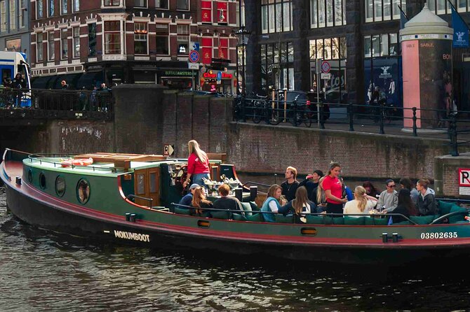 Amsterdam Classic Canal Cruise on a Historic Tugboat - Guides make or break it: the Jan, Mike, and Niels factor