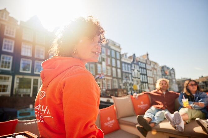 Amsterdam Classic Saloon Boat Canal Cruise with Live Guide - Live guide stops that make Amsterdam make sense