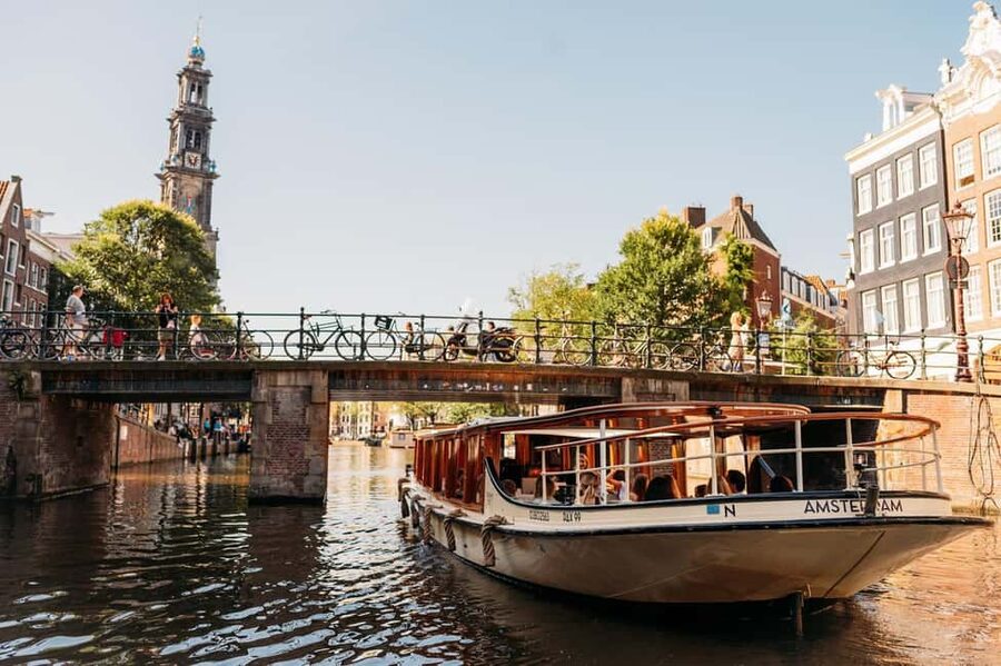 Amsterdam: Classic Saloon Boat Cruise with Cheese & Wine - The vibe: lively hosts, attentive service, and a cozy group feel