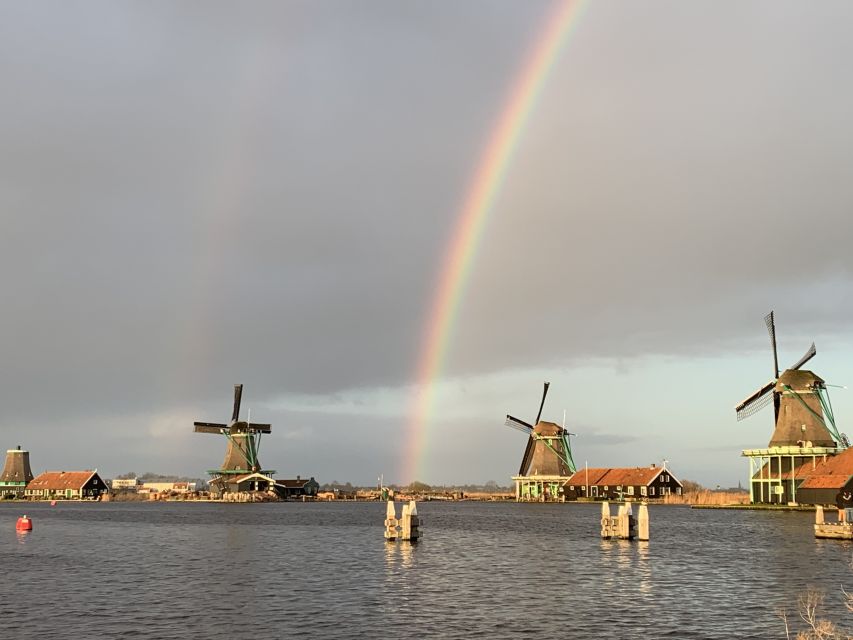 Amsterdam: Countryside Bike Tour and Zaanse Schans Windmills - Domineestuin Wooden Houses: A Taste of Local Neighborhood Feel