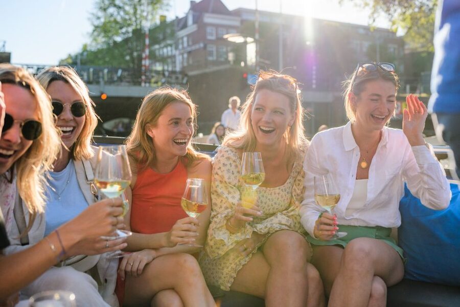 Amsterdam: Covered Canal Booze Cruise with Unlimited Drinks - The one-hour route: Red Light District, Central, and canal-belt classics