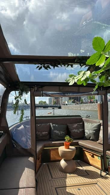 Amsterdam: Covered Heated Canal Cruise with Bitterballen - Local hostess storytelling: names you might hear, style that works