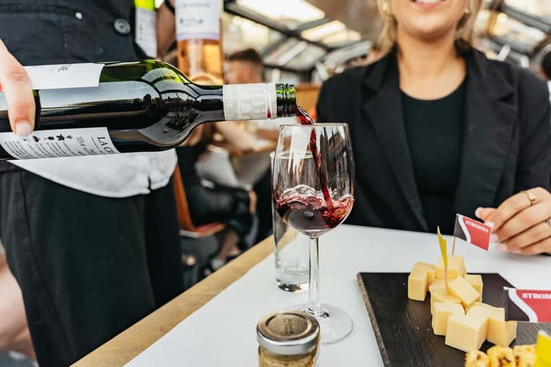 Amsterdam: Cozy Cheese & Wine Cruise Tasting Experience - The cheese platter and unlimited drinks, what to expect in real life