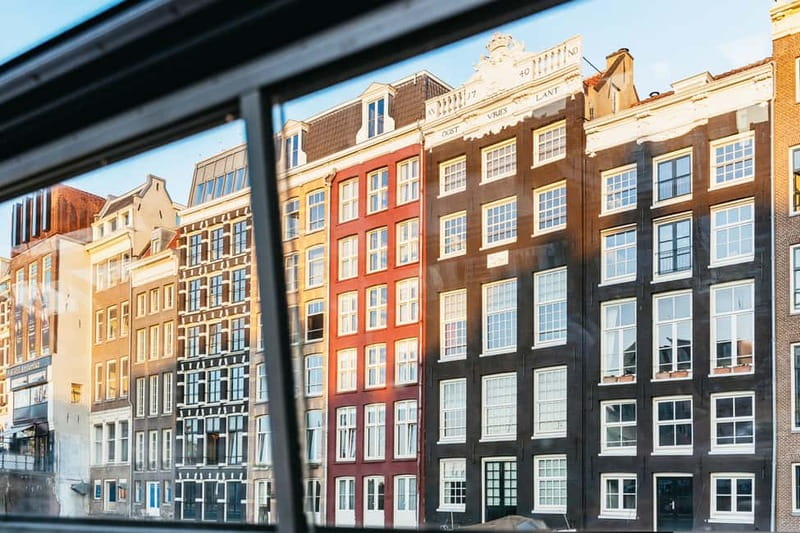 Amsterdam: Cozy Cheese & Wine Cruise Tasting Experience - Getting on at Damrak Pier 5, close to Central Station