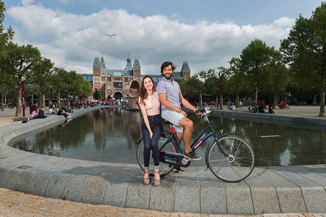 Amsterdam: E-Bike Sightseeing Tour - Dam Square to Nieuwe Kerk, Royal Palace, and the National Monument zone