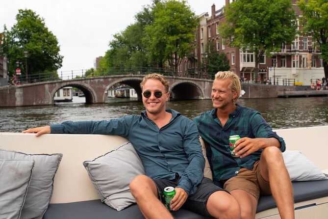 Amsterdam: Evening Candle Light Cruise With Wine & Cheese - Floating Amsterdam to the Red Light District and beyond