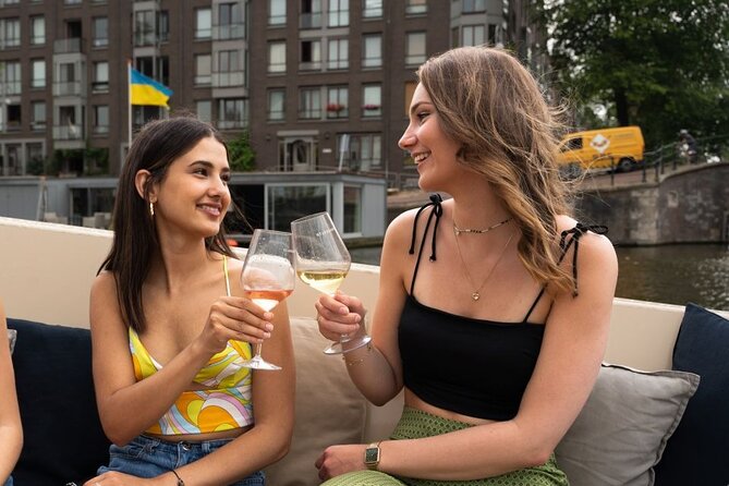 Amsterdam: Evening Candle Light Cruise With Wine & Cheese - The canal route you actually care about: Jordaan, Prinsengracht, Margere Brug, Golden Bend