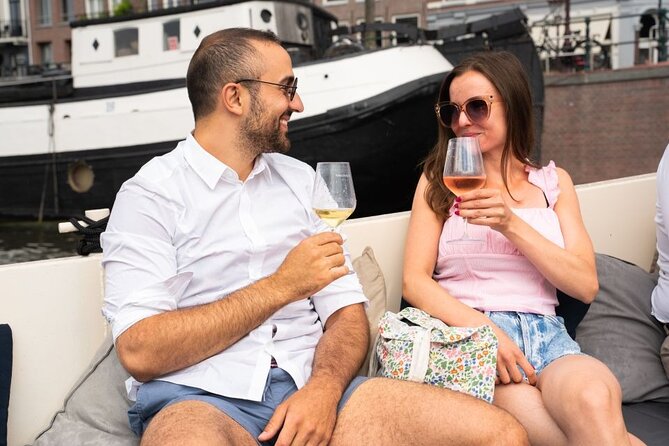 Amsterdam: Evening Candle Light Cruise With Wine & Cheese - The covered boat setup, blankets, and the comfort factor that matters